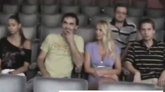 Busty blonde Nikita Valentin groped hard by men in cinema seats