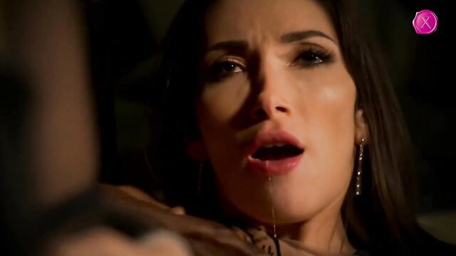 Brunette beauty with open mouth in intense closeup oral scene