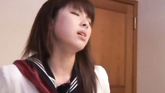 Japanese schoolgirl Megumi in sailor uniform moaning passionately