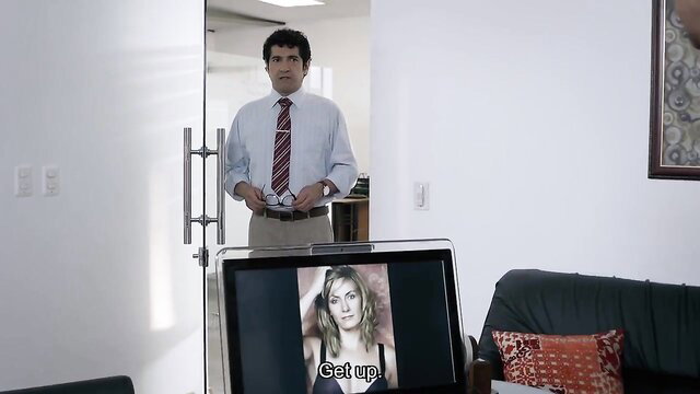 Camy Jiménez in Infieles S01E01 on TV, suited man watches her 'Get Up' (2017)