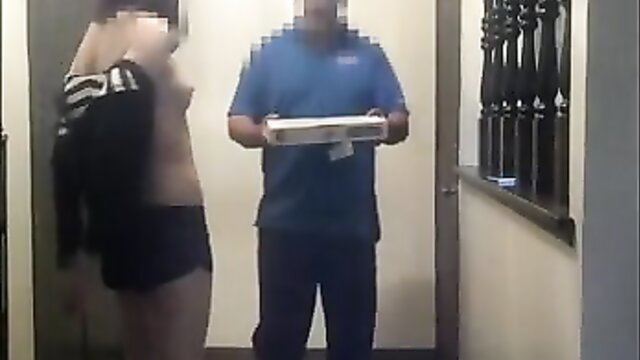 Topless pretty girl in shorts pays pizza guy tip at door