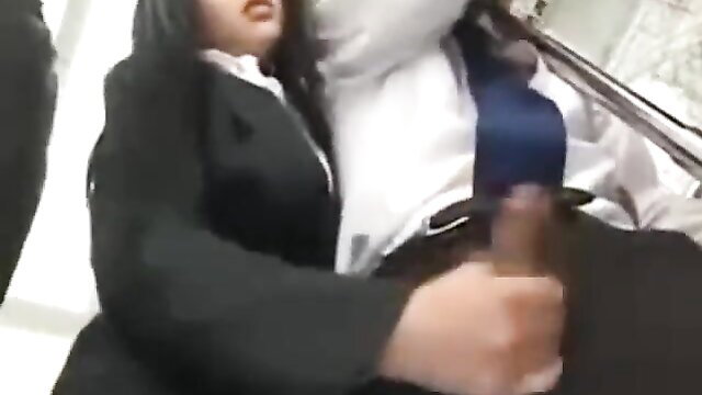 Asian woman in suit gives handjob on public bus