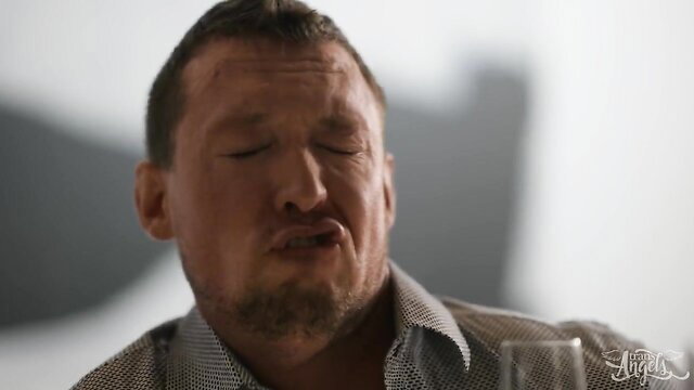 Skinny trans man grimacing in intense sodomy scene outdoors