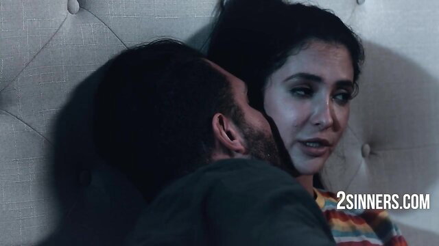 Emotional couple kissing passionately before college goodbye