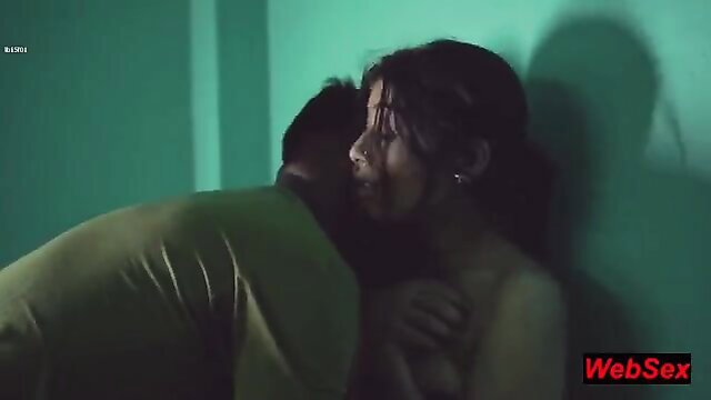 Indian beauty pressed against wall in passionate real lovemaking embrace