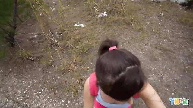 Becca Pierce tiny brunette girl walking in pink tank top outdoors