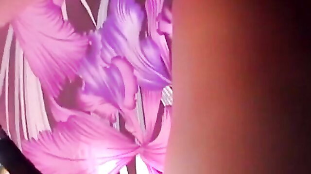 Pink orchid flower closeup in vibrant purple-pink tones