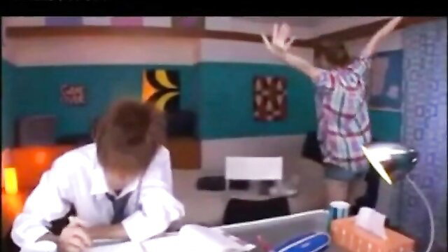 Cute big boobs tutor in plaid shirt stretches arms over desk