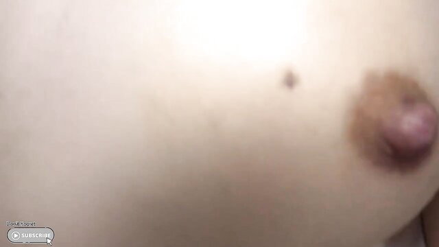 Closeup of perky Asian nipple on pale breast, tsundere JAV tease