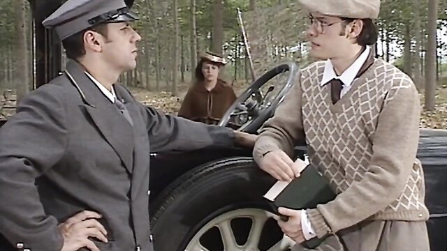 Draghixa Laurent in vintage cop uniform forest car scene
