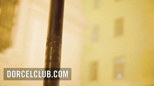 Alexis Crystal blondie near lamppost in steamy night scene