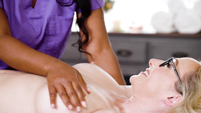 Ebony masseuse Mocha Menage massages nude client Crystal Clark