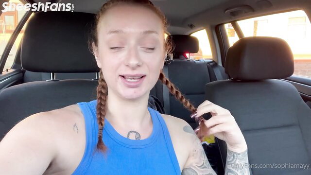 Redhead Sophiamayy with pigtails in tank top in car OnlyFans
