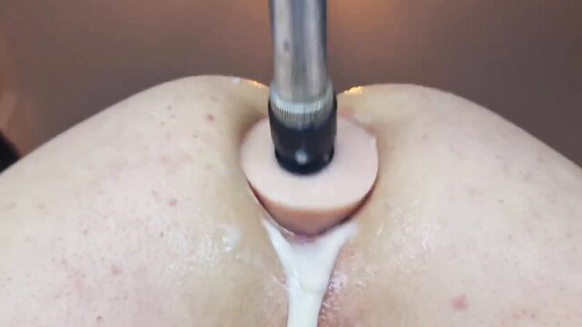 Pale ass fucked hard by sex machine dildo with creampie overflow