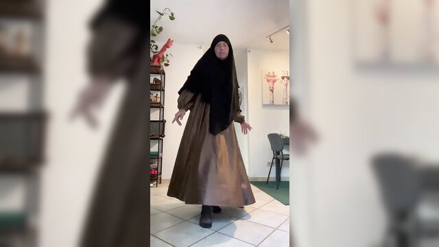 Fatima slut in hijab and abaya dancing seductively
