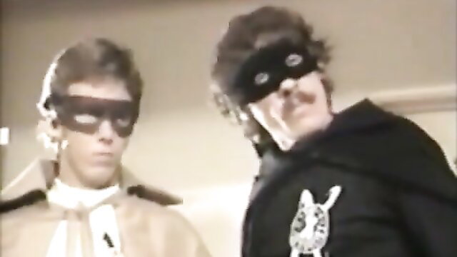 Amber Lynn with Dickman and Throbbin in masked dual team threesome