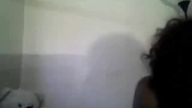 Closeup of black woman's wet pussy in steamy solo tease