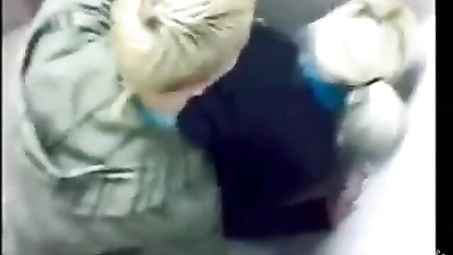 Blonde guy pounds pale girl's ass in club toilet