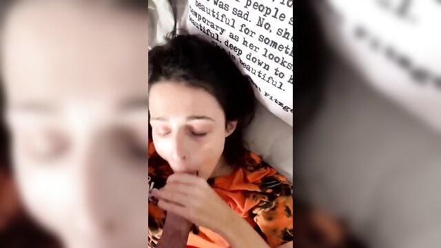 Brunette beauty deepthroats huge cock, eyes watery in ecstasy