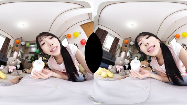 VR JAV Asian babe in pink top holds baby bottle smiling playfully