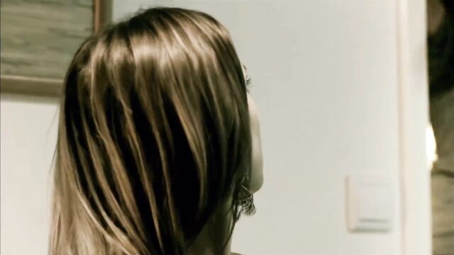 Mafalda Pinto profile view in seductive indoor scene from A Despedida