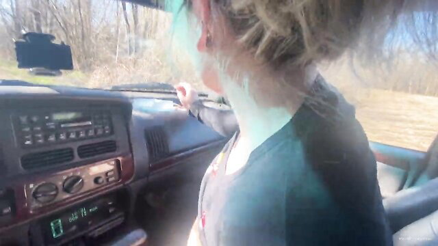 Amateur blonde couple making love in car forest POV