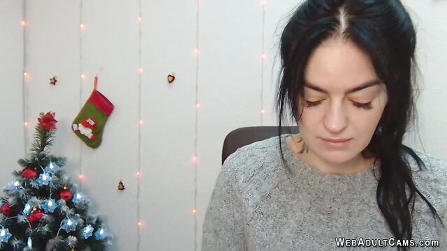 Dark haired Ukrainian amateur babe in sweater on Christmas webcam