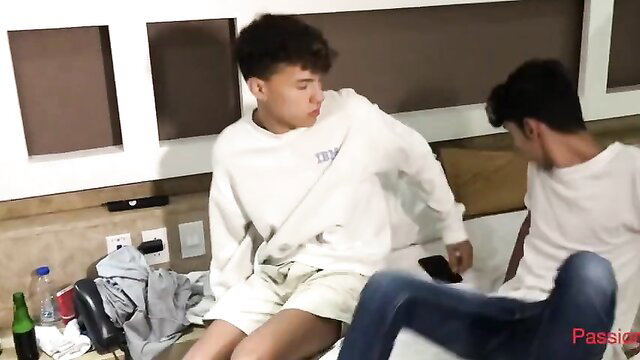 Two horny Asian twinks in hotel room foreplay threesome tease