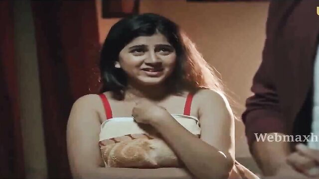 Indian babe in red bra and apron, teasing expression, Ullu series