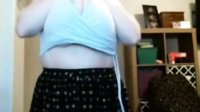 Curvy white girl with ginormous natural tits in wrap top and pajama bottoms
