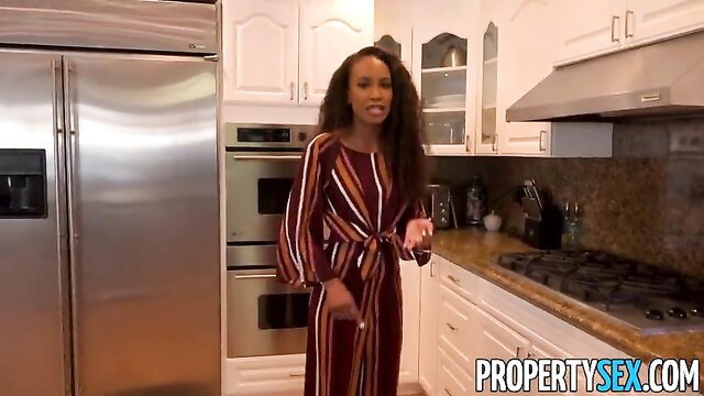 Demi Sutra in striped dress in kitchen, hot black realtor tease