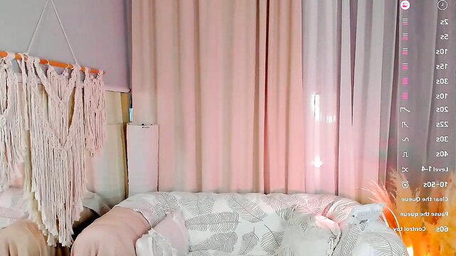 Rose Charming solo cam stream on pink couch with dice and dildo