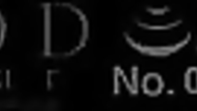 Japanese woman with big tits in low-cut top, smiling playfully