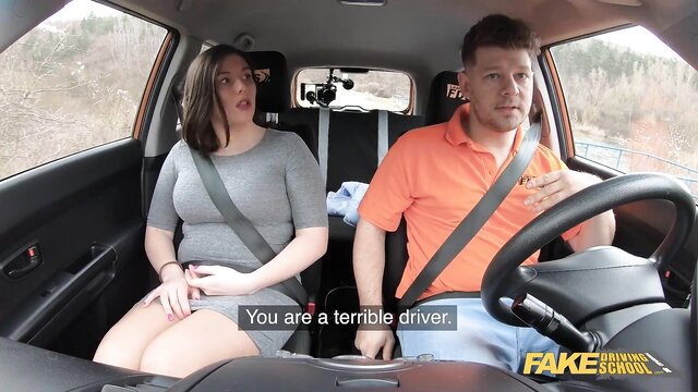 Fake Driving School busty brunette mocks bad driver in car fuck lesson