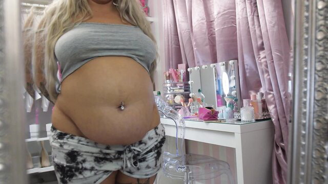 Blonde BBW teases fat pregnant belly in tight crop top and sweats