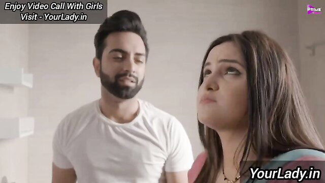 Indian couple in intimate moment, bearded man and long-haired beauty close up