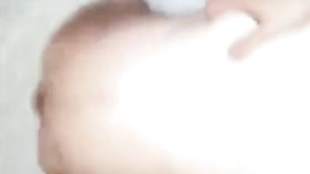 Blurry closeup of 63yo silver dad hunk's muscular chest and arm