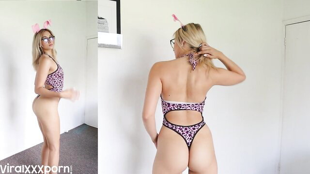 Emalie Das teases phat white booty in leopard thong swimsuit
