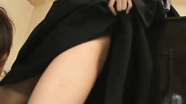 Sexy Japanese nun lifting black dress, exposing thigh in JAV tease