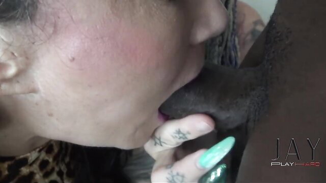 Gilf with tattoos sucking massive BBC closeup