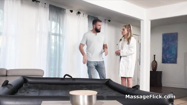 Hot blonde doctor in lab coat gives special massage therapy to fit guy