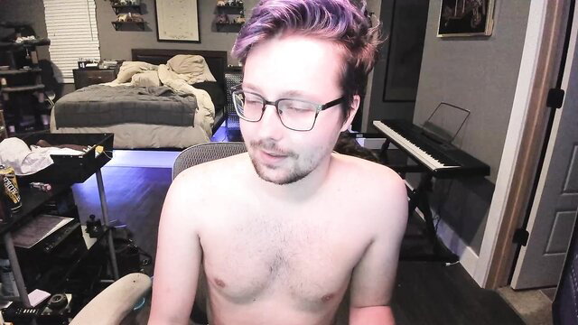 Purple-haired twink gamer guy shirtless in bedroom webcam
