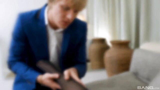 Emma Brown in hot anal action with partner on sofa