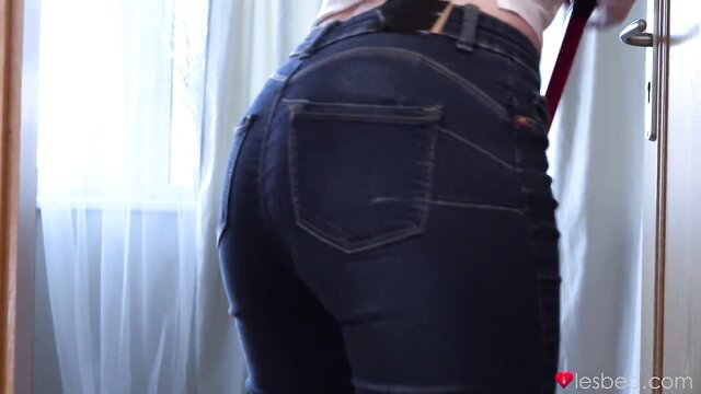 Hot girl in tight jeans and garter belt shows off big ass in steamy tease