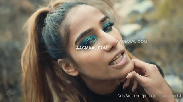 Poonam Pandey sexy closeup with ponytail, teasing smile, heavy makeup