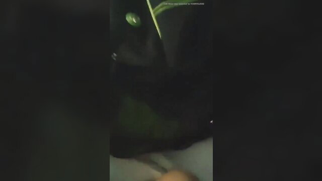 Asian slave slapped hard on face by hand in dark BDSM scene