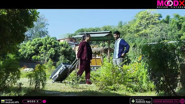Indian step sister in maroon suit with suitcase talks to step bro outdoors Mood X
