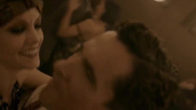 Margot Robbie smiles seductively at man in Amsterdam 2022 hot celeb scene