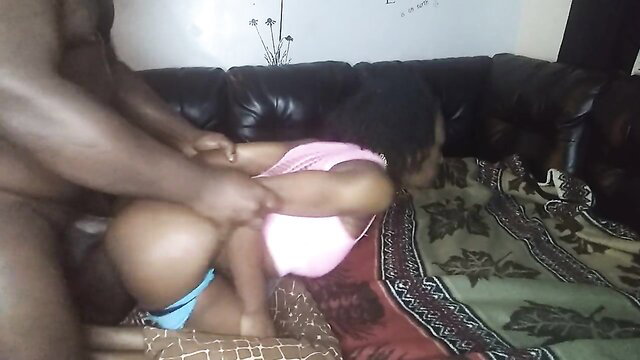 Black guy fucking tiny ebony girl's pussy doggy on couch amateur