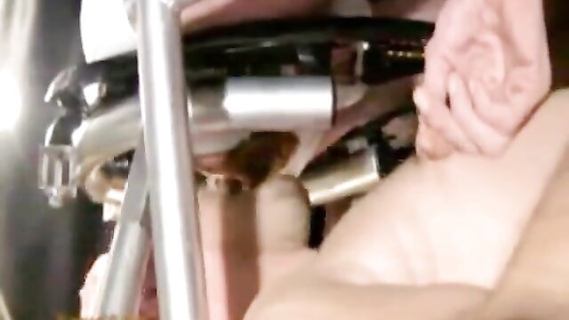 Wildpork 666 Berlin Chapter 1 closeup hand stroking thick cock on metal frame
